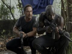 New ‘Plane’ Image Reveals a Bloodied Gerard Butler in the Jungle.